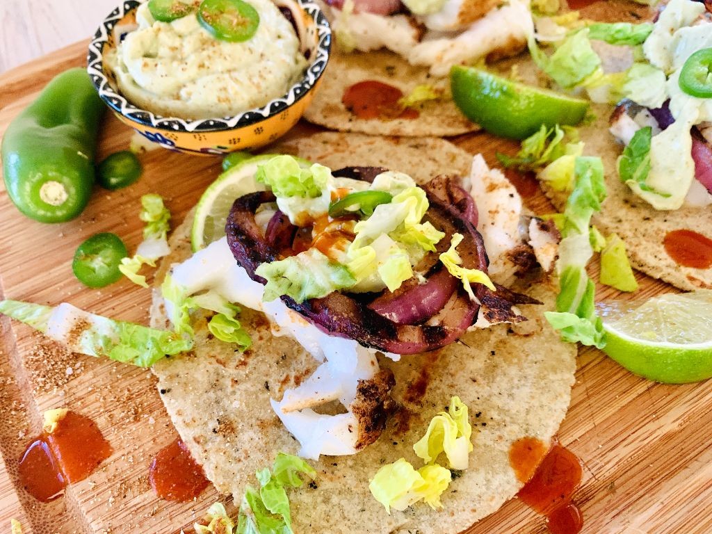 Chilean Sea Bass Tacos with Avocado Crema