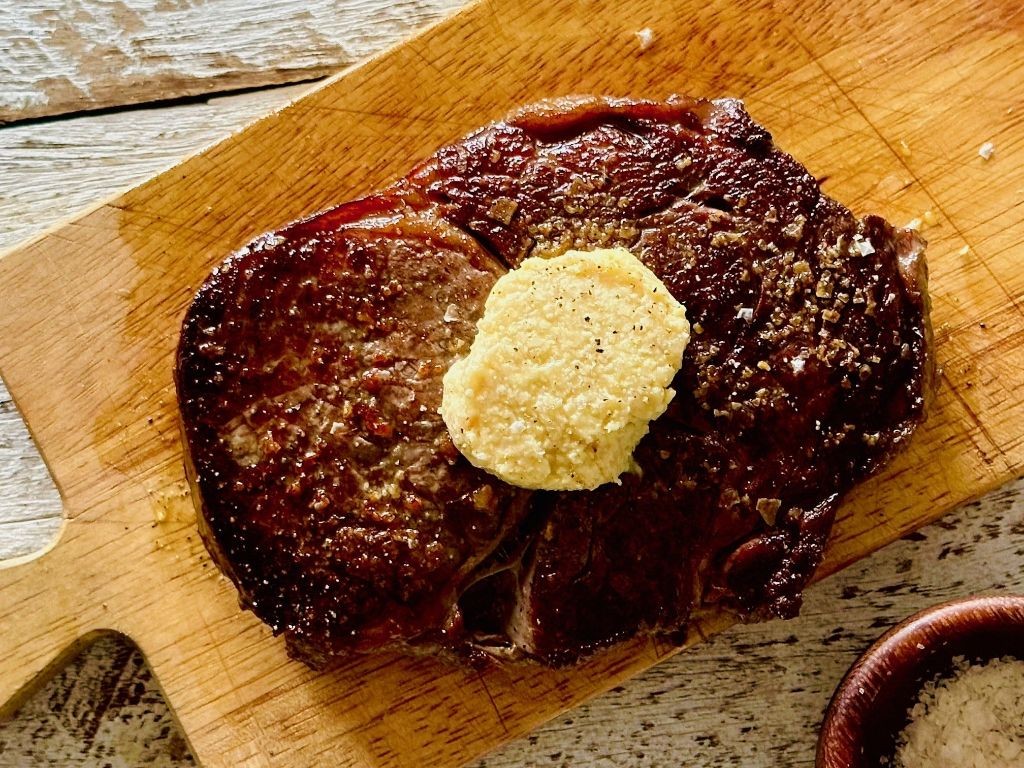 Eye of Round Steak with Roasted Garlic Butter