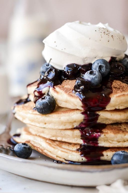 Fluffy Griddle Blueberry Pancakes with Whipped Cream