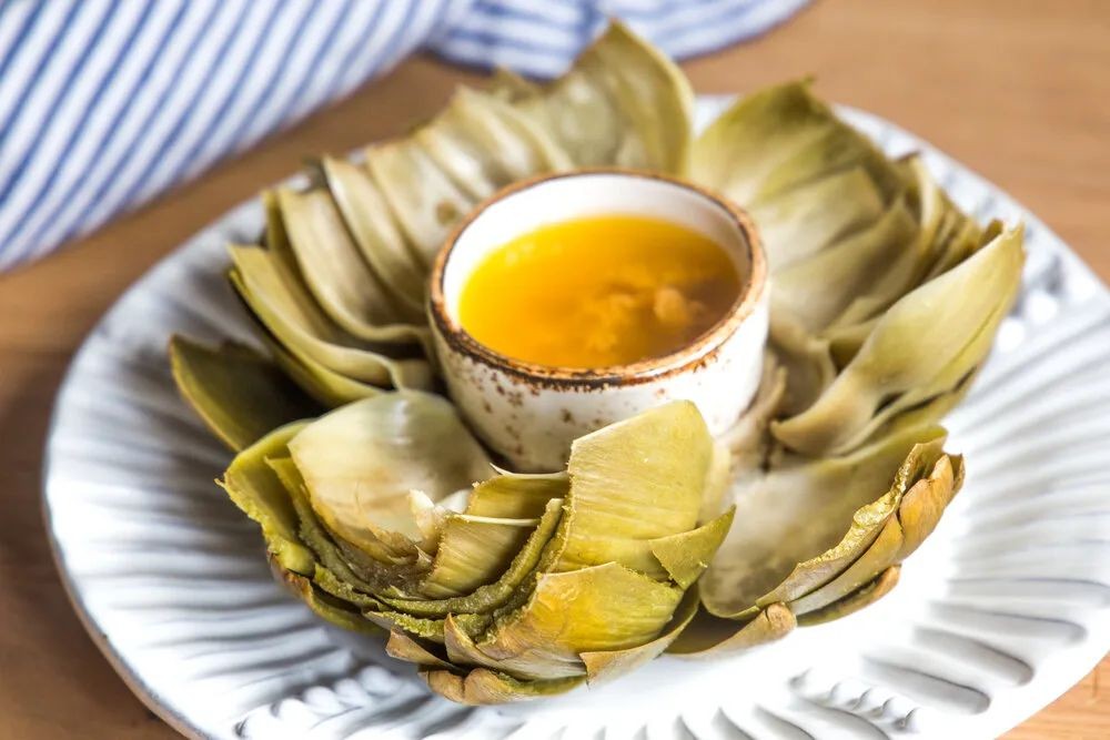 Garlic Butter Steamed Whole Artichokes