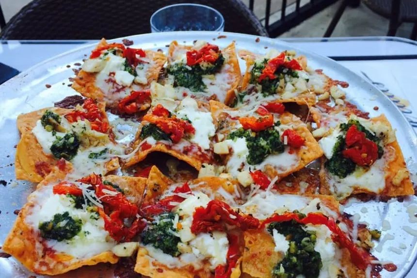Pesto Chicken Nachos with Sun-Dried Tomatoes