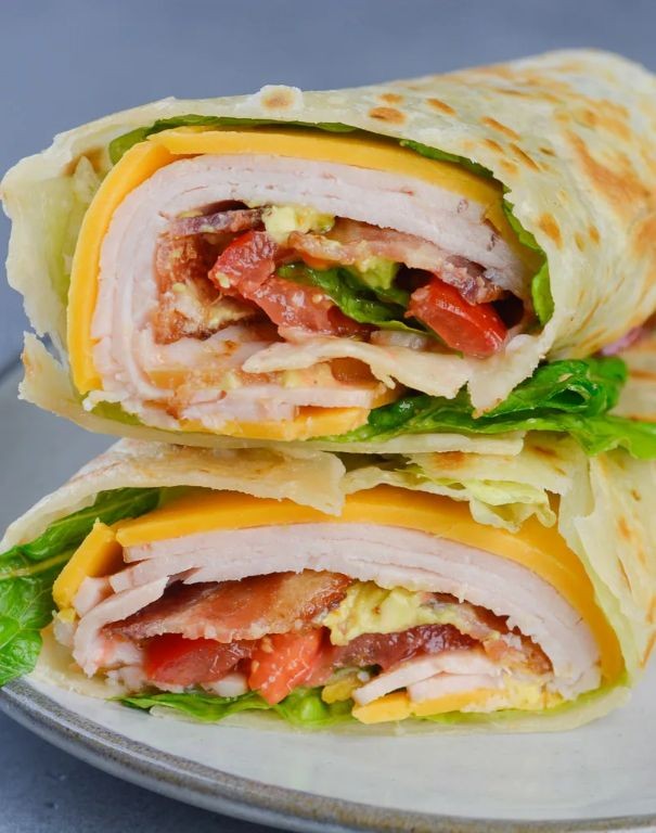 Turkey Club Wrap with Lettuce and Tomato