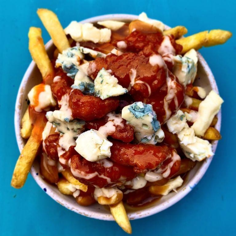 Buffalo Chicken Poutine with Blue Cheese Drizzle