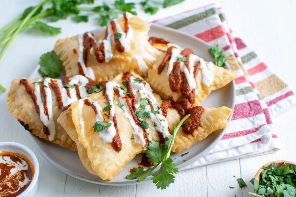 Cheesy Sopaipillas with Tomato Chutney