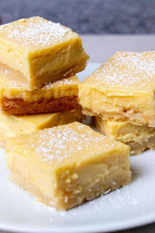 Limoncello Lemon Bars with a Dusting of Powdered Sugar