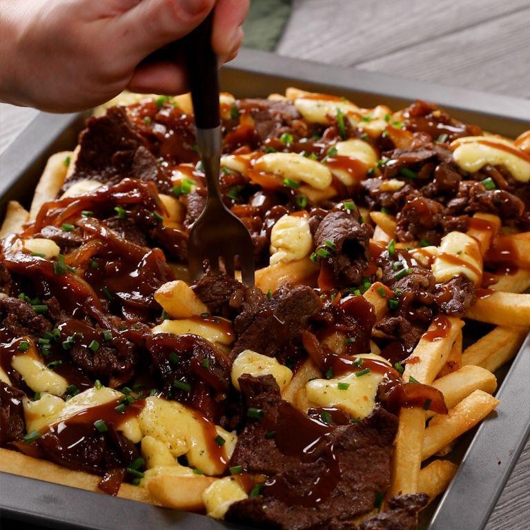 Philly Cheesesteak Poutine with Caramelized Onions